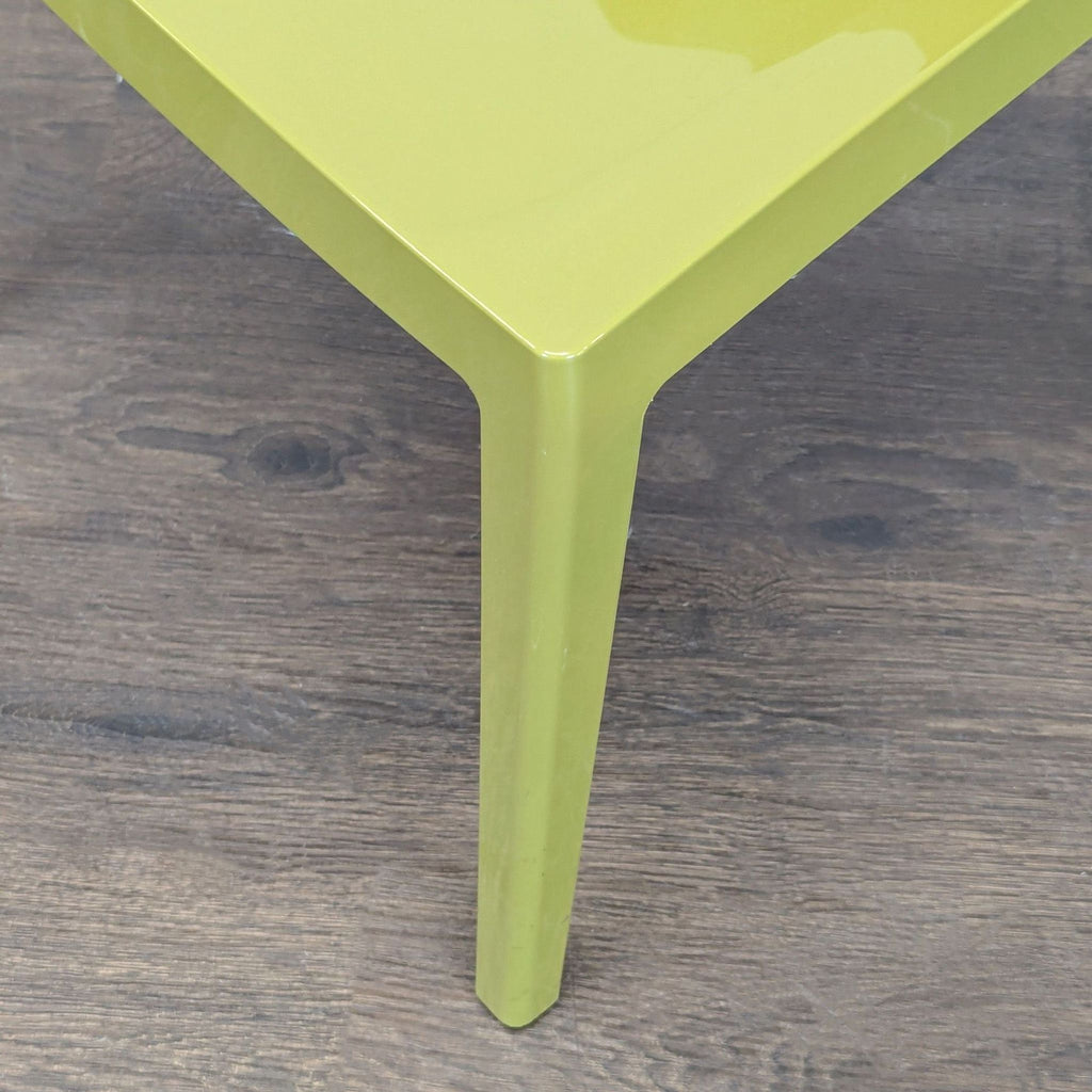 3. Contemporary dining chair by Kartell, featuring a smooth silhouette and durable material for daily use.