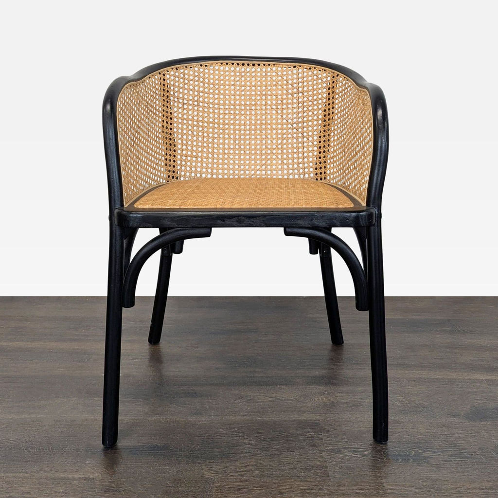 Pottery Barn dining chair with a solid beech wood frame and natural rattan seat pad.  