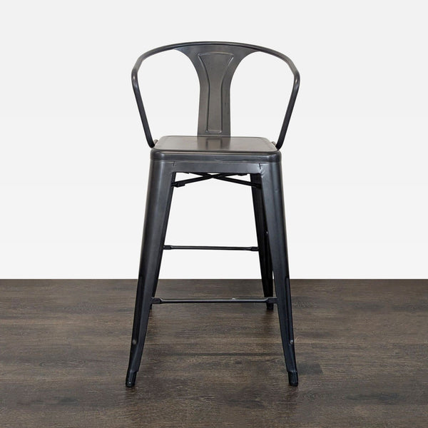Industrial metal bar stool with a backrest and footrest from the Stools, Ottomans & Benches category.