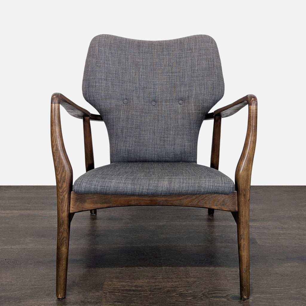 Mid-century modern lounge chair with a wooden frame and grey upholstery, perfect for stylish living rooms.