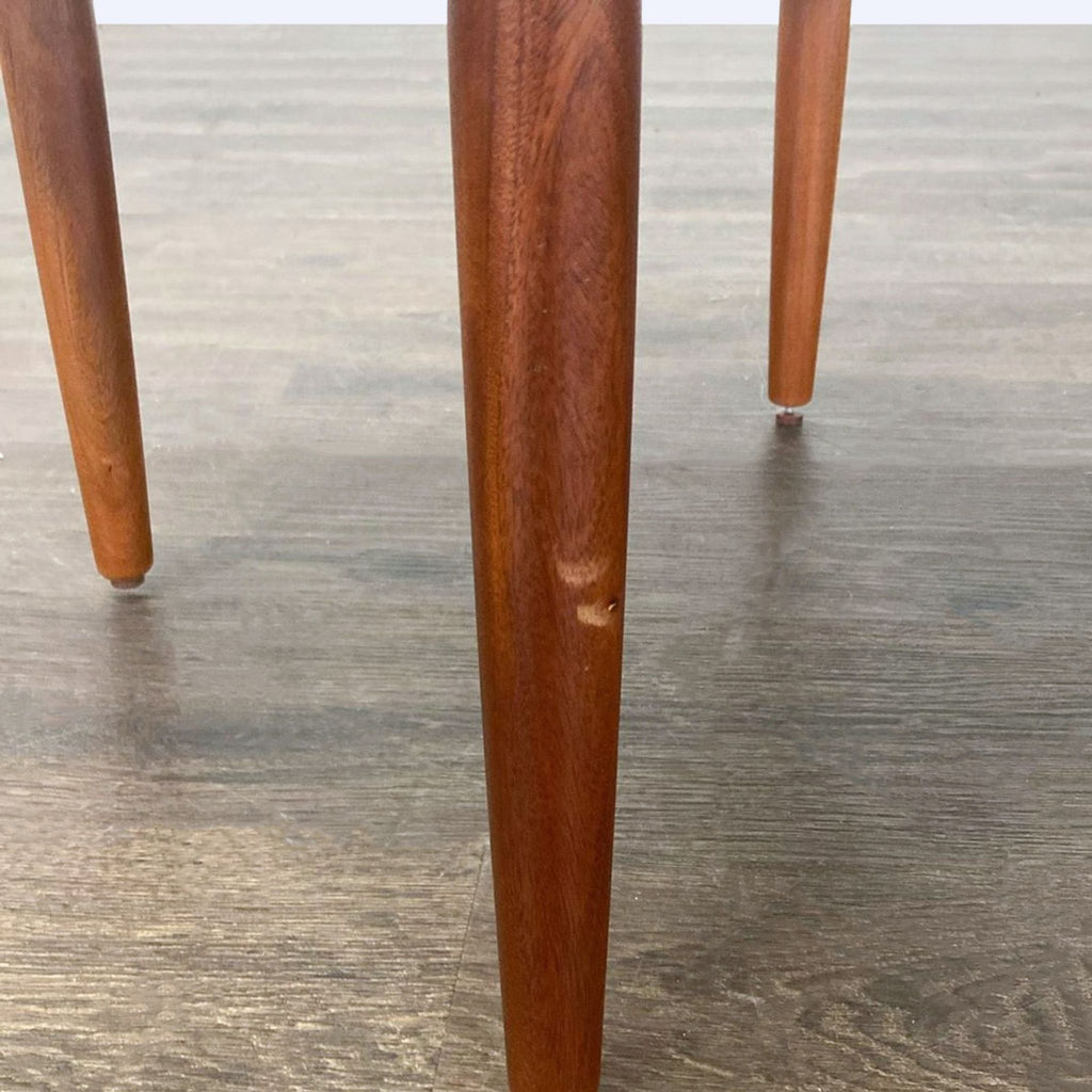 3. Contemporary end table by West Elm, featuring a sturdy structure and elegant look suitable for modern interiors.