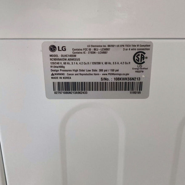 1. Close-up of an LG washer/dryer model and serial label on a white appliance.