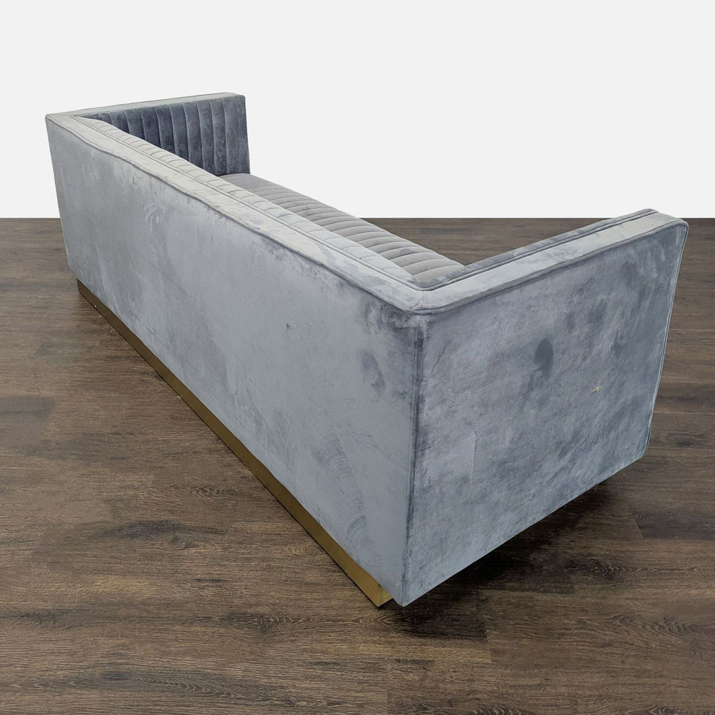 Modern Modway 3-seat sofa in gray velvet with gold base, highlighted by stylish vertical tufting details.