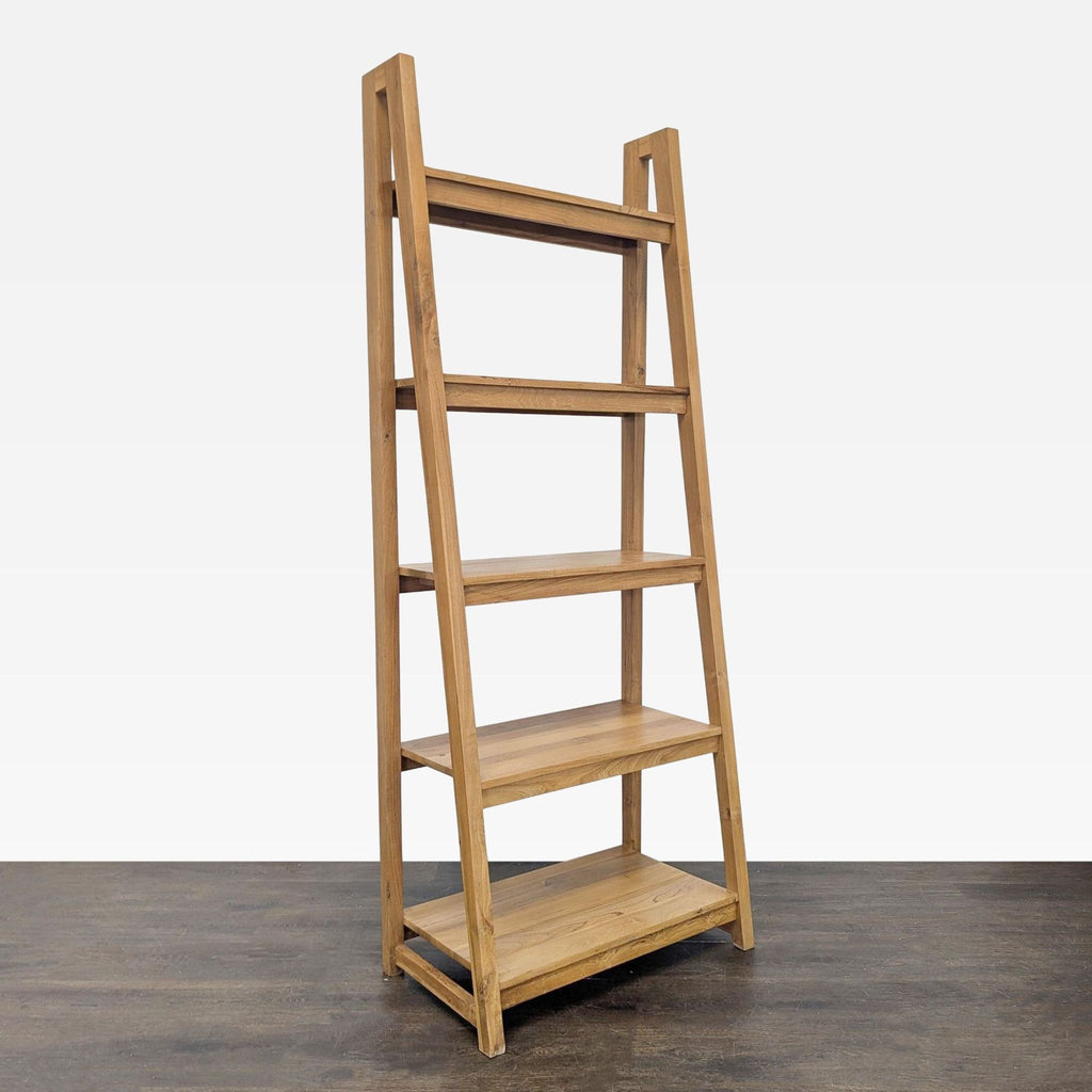 Modern natural wood bookshelf by Crate & Barrel featuring four shelves, perfect for organizing a living space.