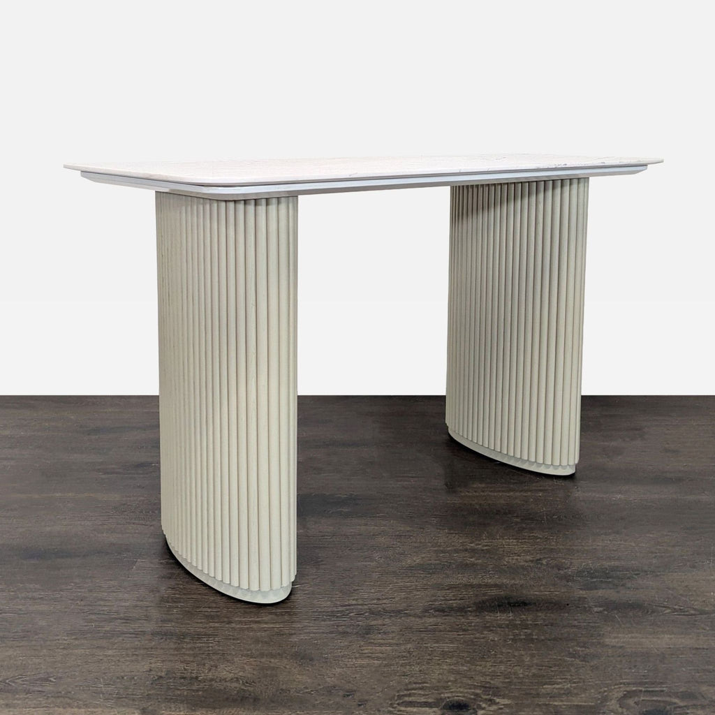 Elegant white marble desk by Rove Concepts, featuring minimalist fluted legs for a stylish office or home setup.  
