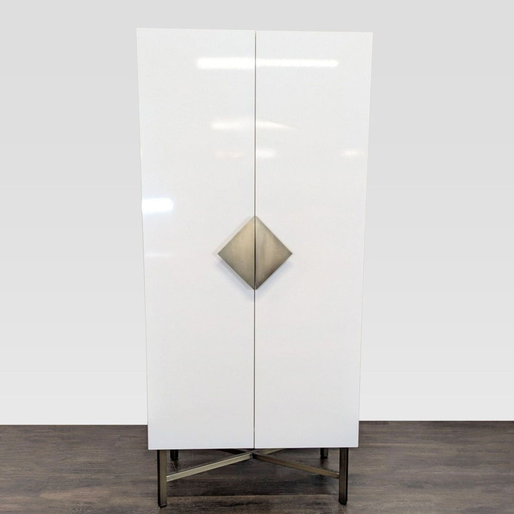 CB2 cabinet with steel legs, wood frame, fixed shelf, brass pole, and brass pulls.  