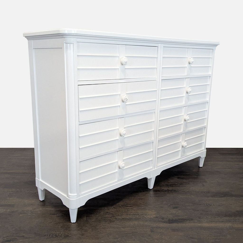 Stanley Furniture white dresser, featuring a louvered design and six spacious drawers for bedroom organization.  