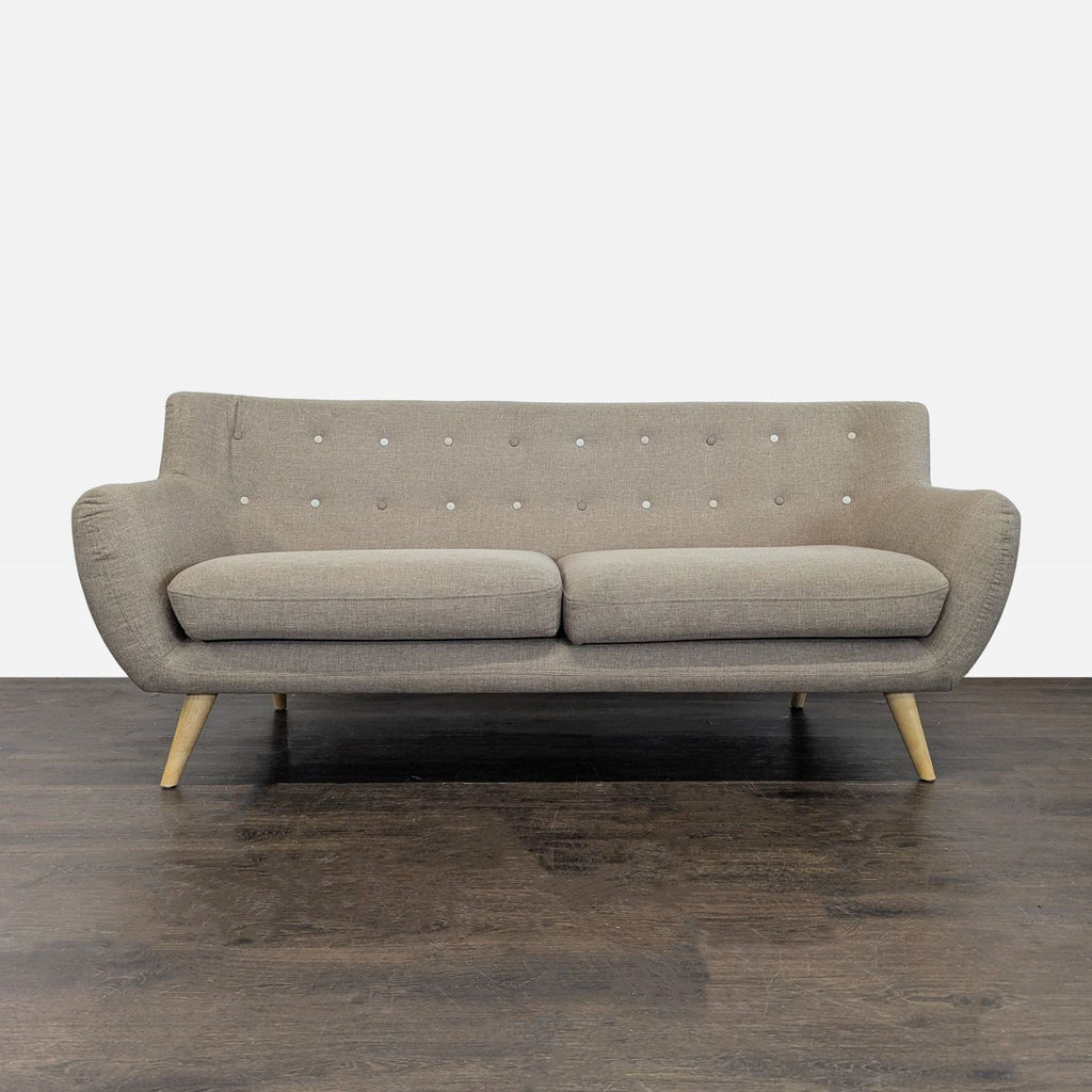 Beige Modway loveseat with mid-century modern tufted back, curved armrests, and angled wooden legs.