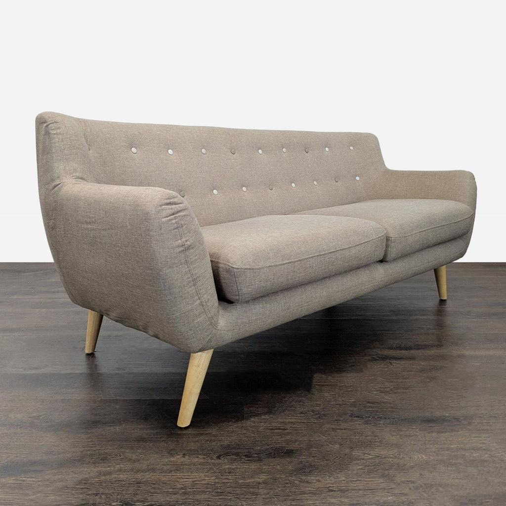 Modway loveseat seats two, featuring beige upholstery, tufted back, and a stylish mid-century modern design.