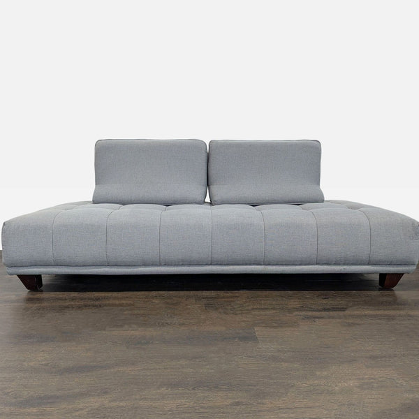 Modern 3-seat sofa in grey fabric with adjustable backrests and sleek, low-profile design.