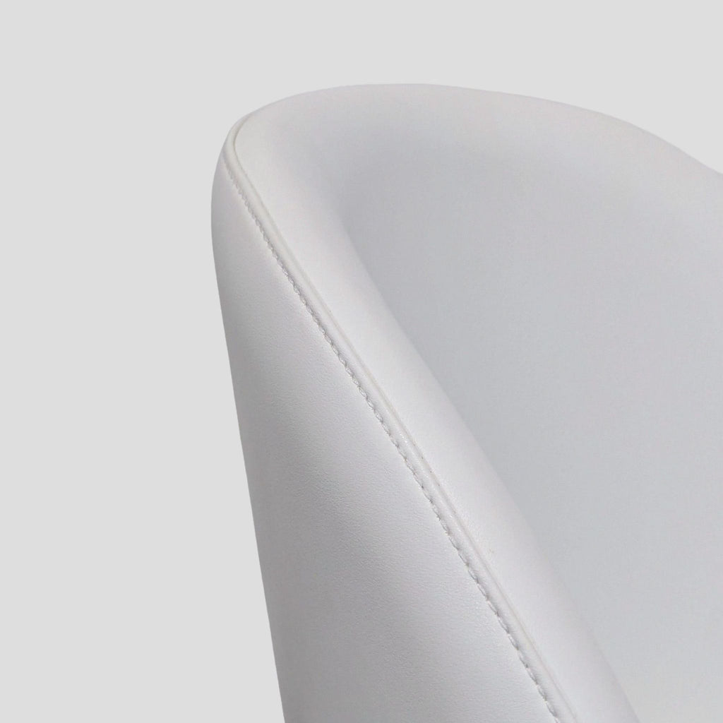 Rove Concepts dining chair with ergonomic, upholstered seat and metal legs; sustainable materials used.  
