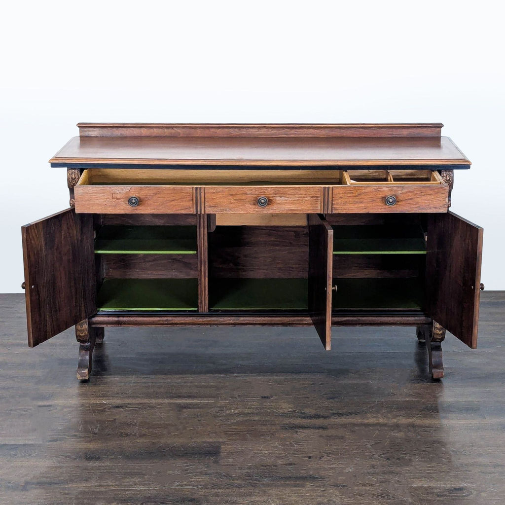 Wooden sideboard credenza featuring spacious storage, ornate carved accents, and elegant medallion cabinet doors.