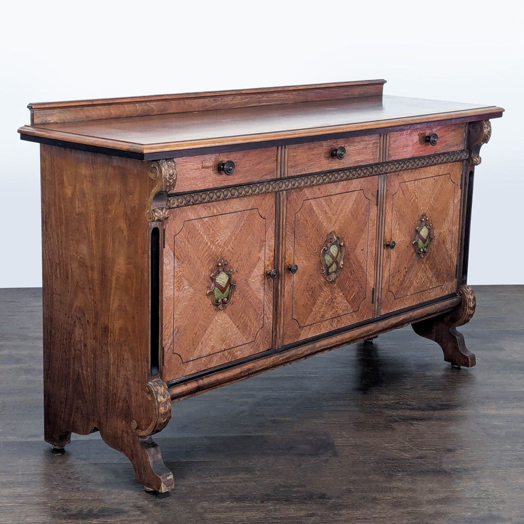 Traditional sideboard with rich wood finish, decorative medallions, and multiple drawers and cabinets for storage.