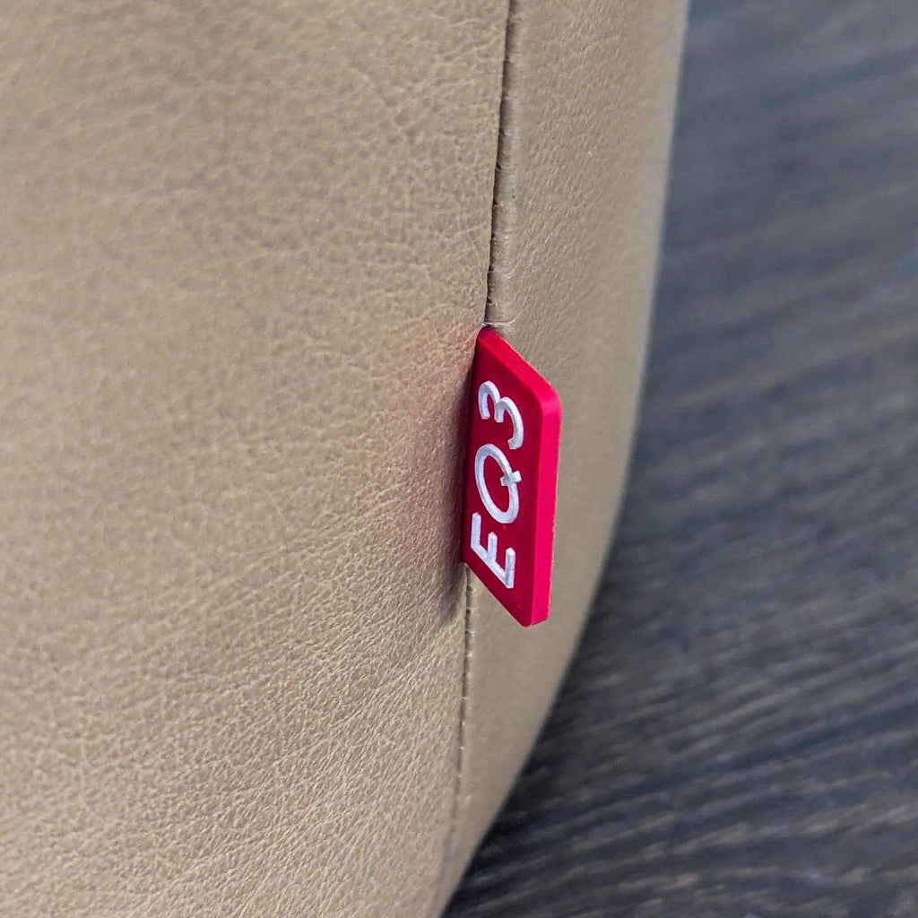 EQ3 Oval Leather Ottoman