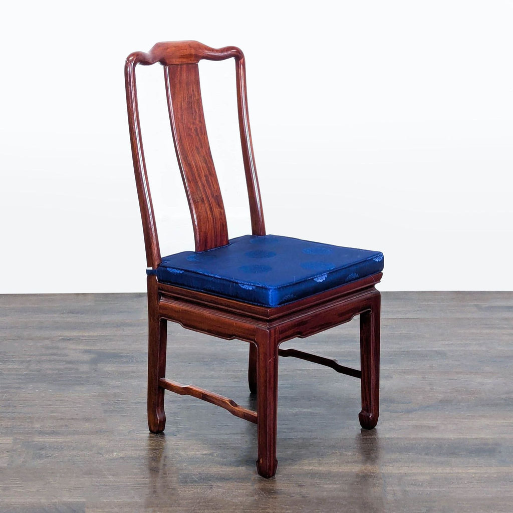 1. Modern wooden dining chair with cushioned seat, set against a white background.