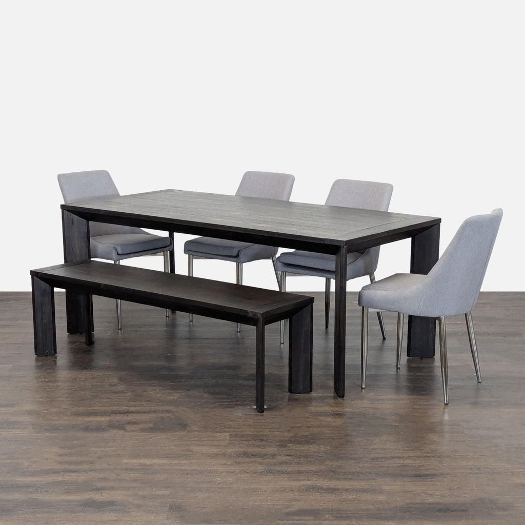 Living Spaces dining set with dark wood table, four grey chairs, and matching bench, perfect for family meals.