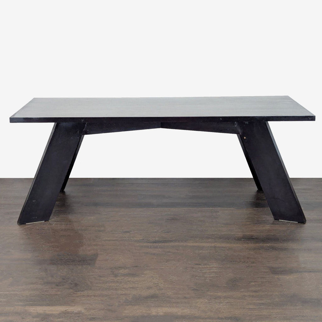 Contemporary dining set featuring a sturdy table with angled legs and six comfortable, grid-back chairs.