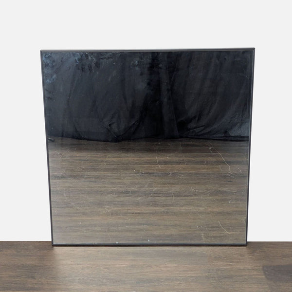 Square Pottery Barn mirror with thin black metal frame, modern and minimalistic style.  