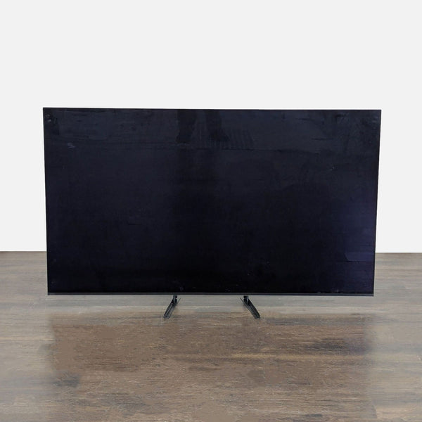 1. Sony TV with a sleek black frame, displaying vivid colors on a modern flat screen.  