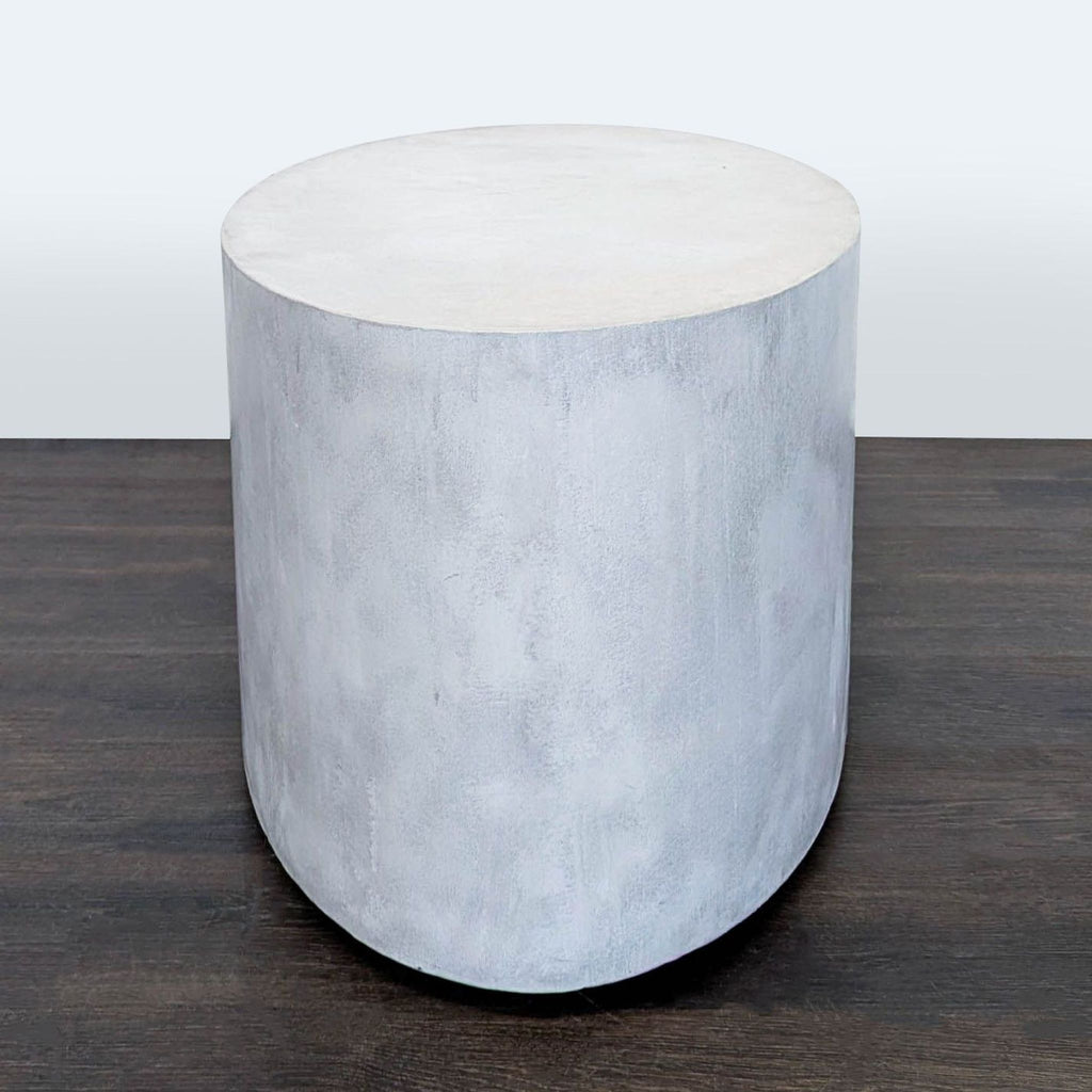 Handcrafted lightweight concrete coffee table in smokey grey, designed by Eric Weil with a floating effect.