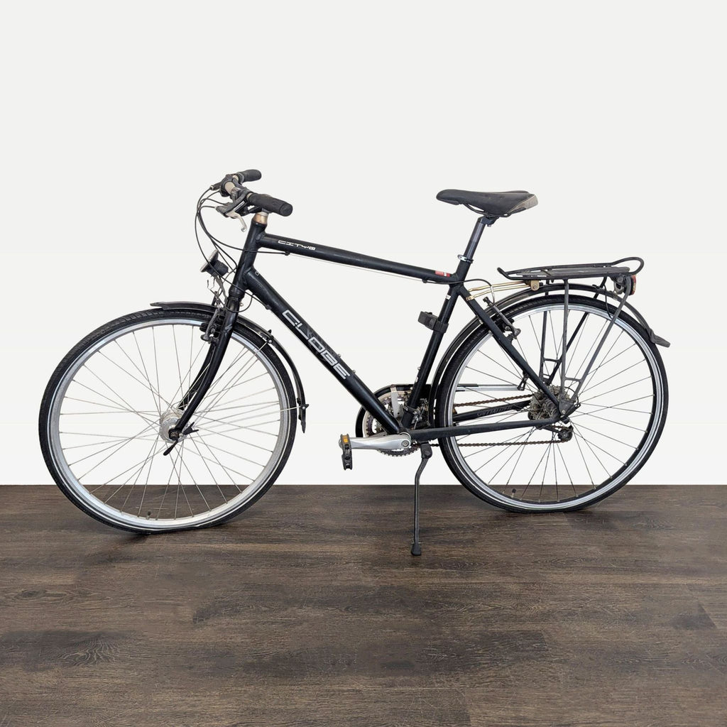 Specialized Globe city bike with rear rack, fenders, and kickstand, ideal for commuting and errands.