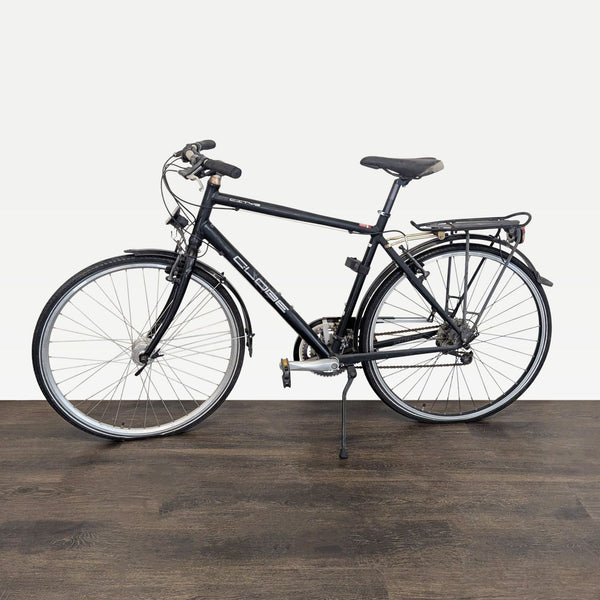 Specialized Globe city bike with rear rack, fenders, and kickstand, ideal for commuting and errands.