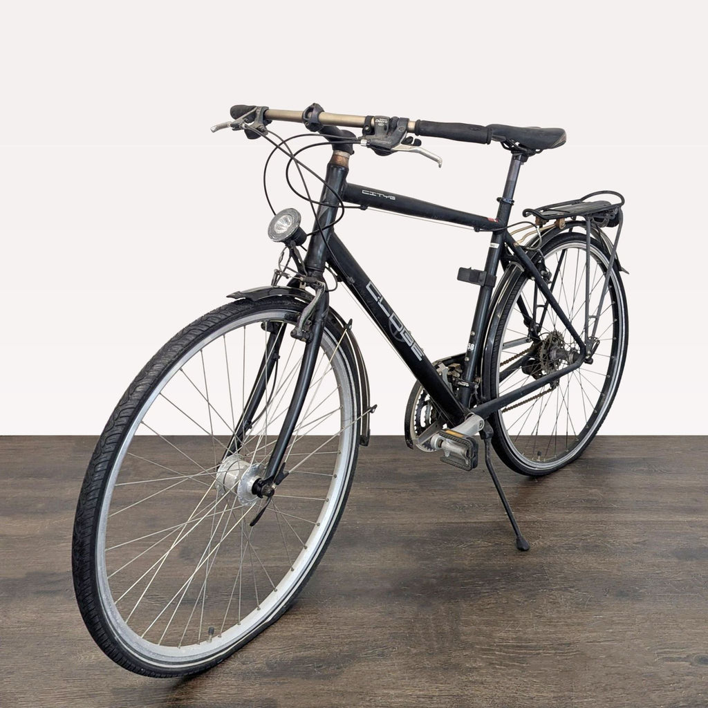Sturdy Specialized city bike featuring comfortable handlebars, practical rear rack, and full fenders.