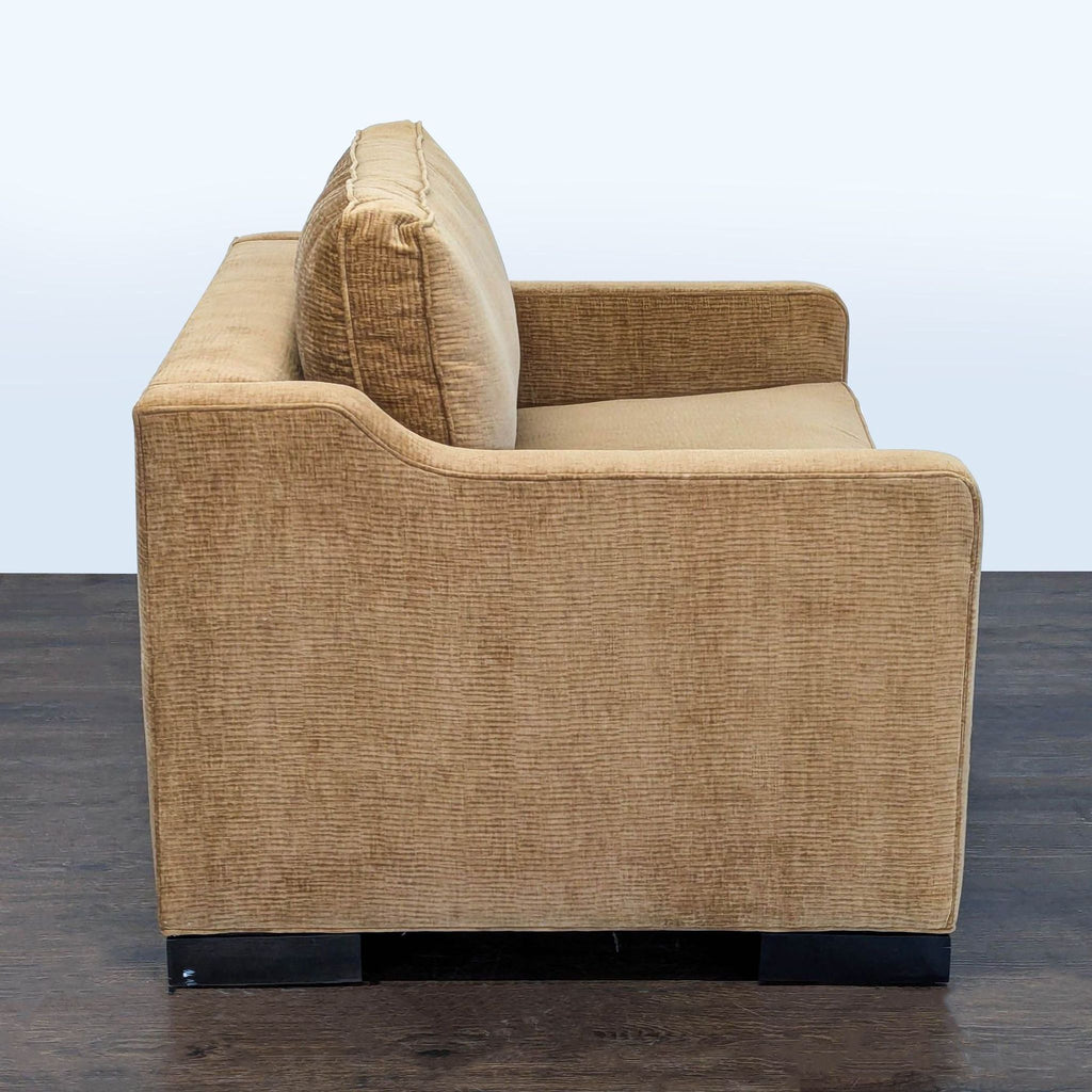 2. Kravet brand sleeper sofa transformed into a bed, featuring plush cushions and a stylish, contemporary design.