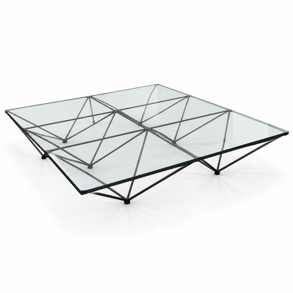 Iconic Alanda coffee table with black geometric steel frame, featuring upturned pyramid shapes, by Paolo Piva.  