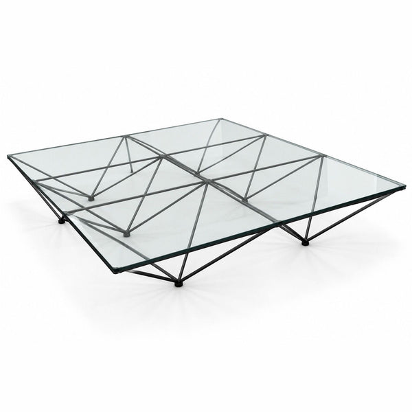 Iconic Alanda coffee table with black geometric steel frame, featuring upturned pyramid shapes, by Paolo Piva.  