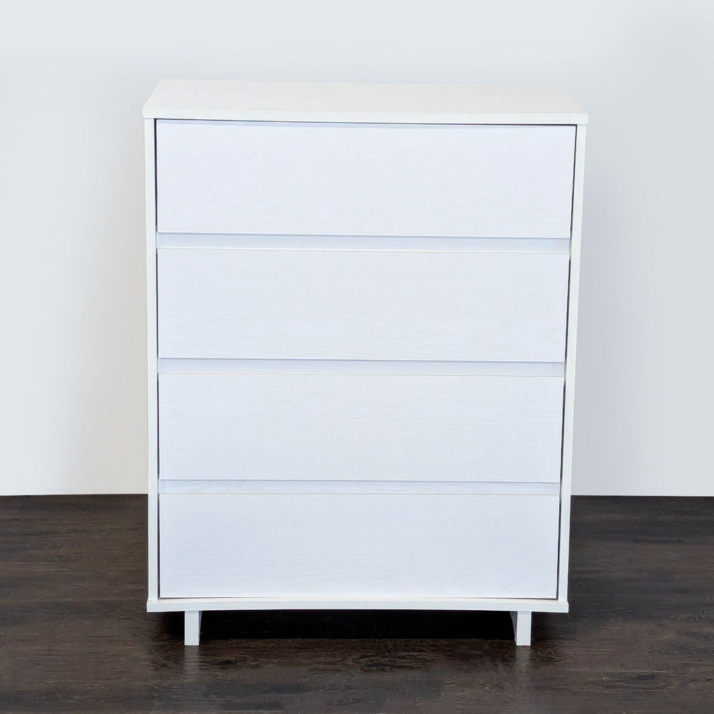 White four-drawer dresser by Target Room Essentials, featuring a modern design for organized storage.  