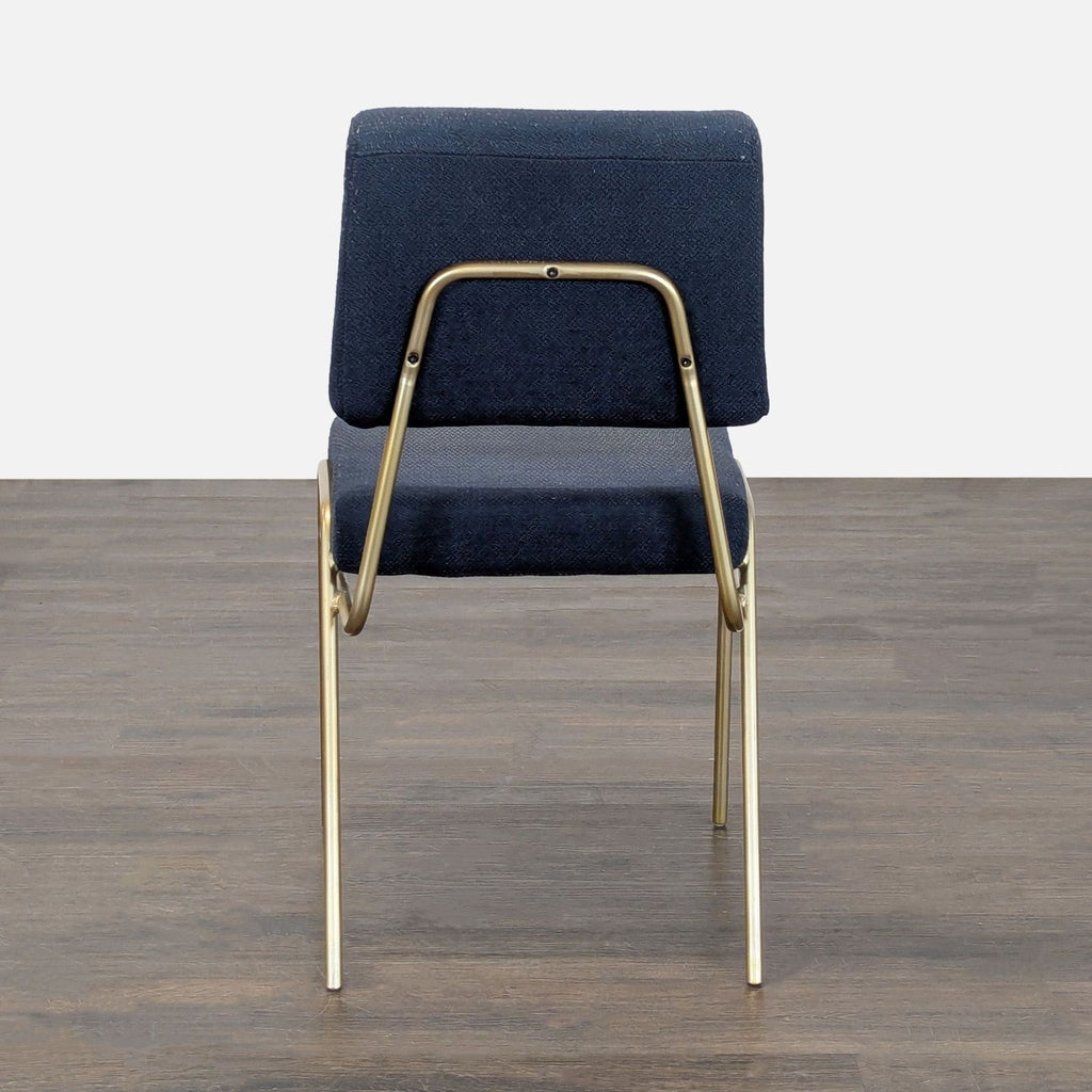 2. Contemporary West Elm dining chair featuring a sturdy wooden frame and soft upholstered seat.