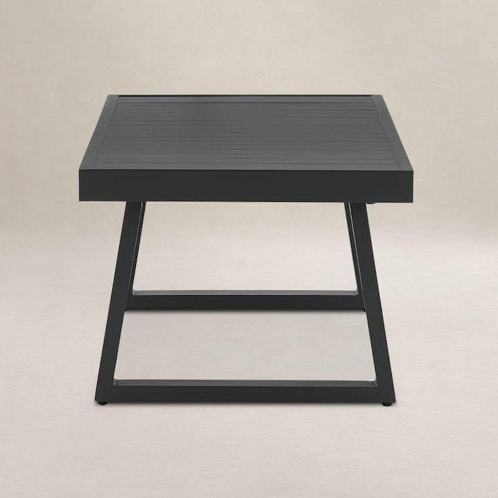 Sleek black Castlery table with sturdy legs and slatted surface, perfect for dining or entertaining.