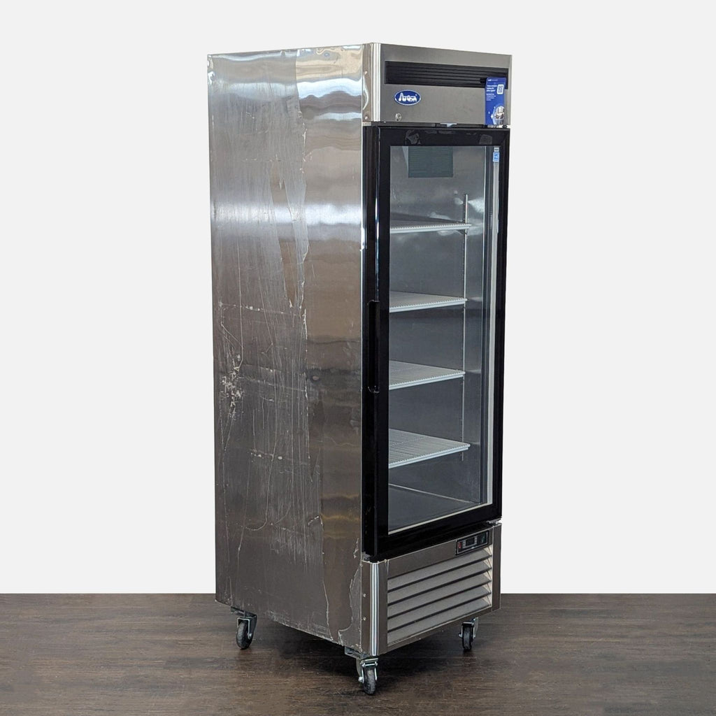 2. Atosa brand upright refrigerator featuring a sleek modern exterior and ergonomic handles for easy access.  