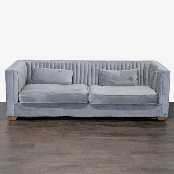 Alder & Tweed 3-seat sofa in plush grey velvet with vertical tufting, wood legs, and matching pillows.