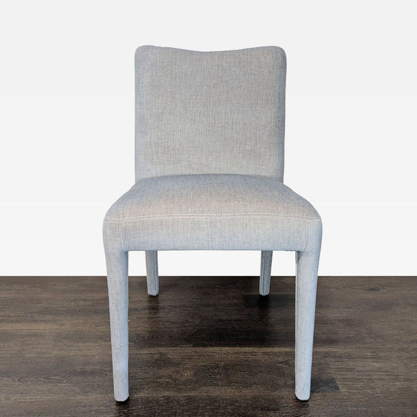 Bow-tie curve dining chair by New Pacific Direct featuring a medium-height back and modern silhouette.  