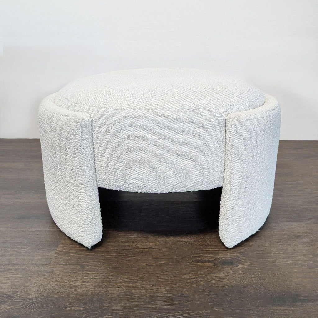 Round white bouclé ottoman by New Pacific Direct with modern legs, ideal as a stool or footrest.