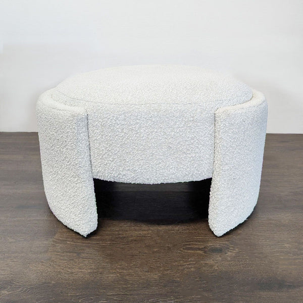 Round white bouclé ottoman by New Pacific Direct with modern legs, ideal as a stool or footrest.