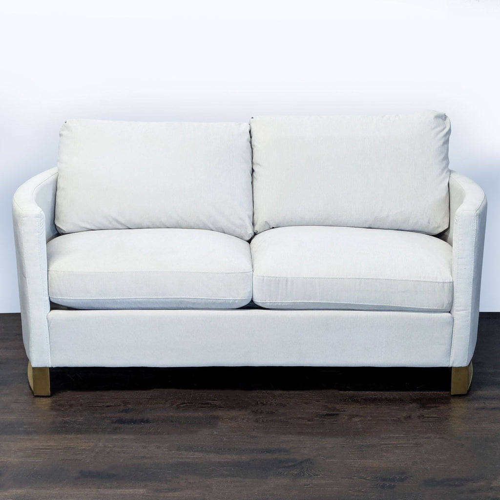 1. Coaster Loveseat with modern design, featuring plush cushions and soft neutral upholstery, ideal for cozy living rooms.  