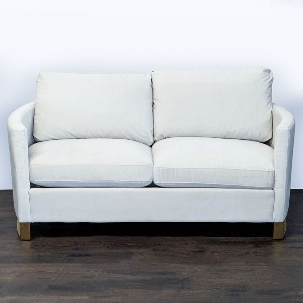 1. Coaster Loveseat with modern design, featuring plush cushions and soft neutral upholstery, ideal for cozy living rooms.  