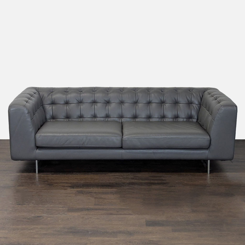Jason Furniture dark gray 3-seat leather sofa with tufted back, modern style, and sturdy feet.