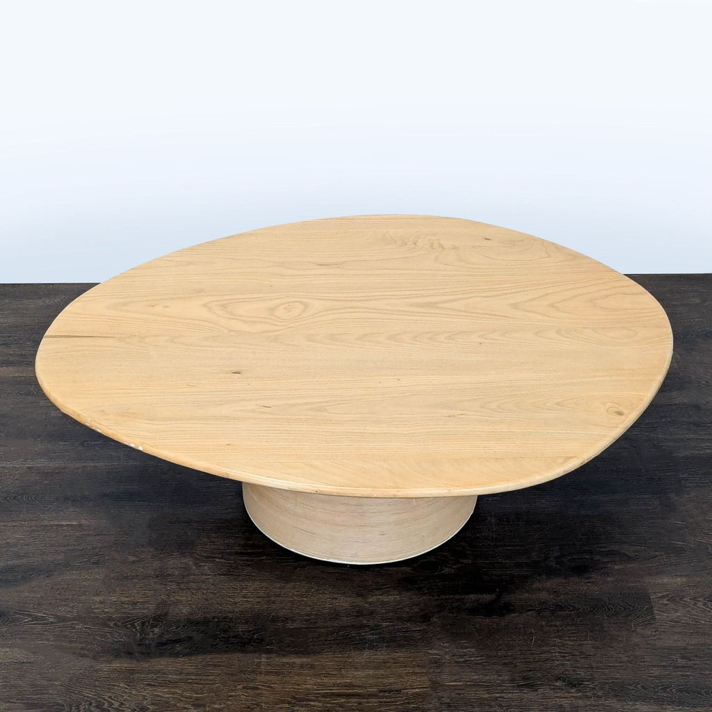 2. Coffee table with a smooth veneered base, perfect for contemporary living spaces.