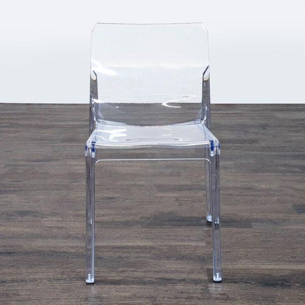 Clear polycarbonate dining chair by CB2, designed by Alberto Turolo, with glass-like finish made in Italy.