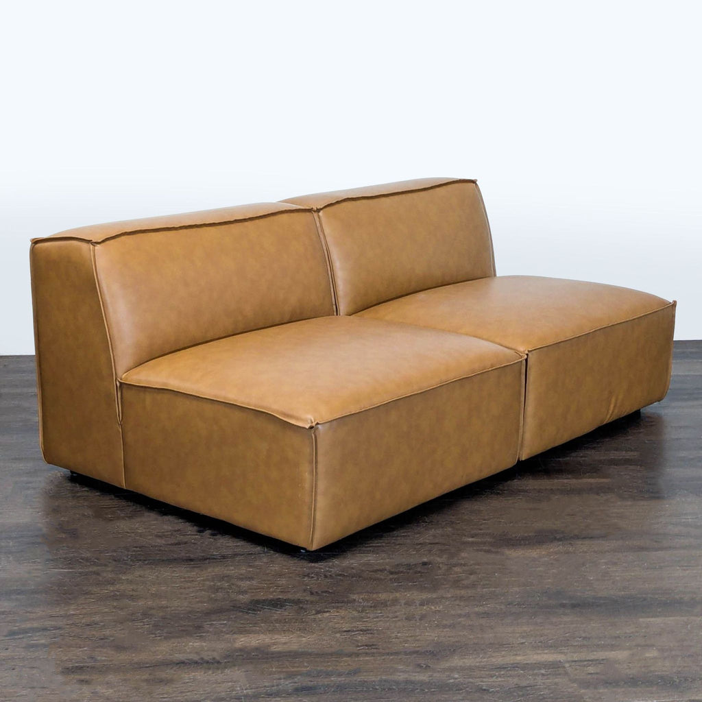Sleek Modway sectional sofa in soft tan faux leather, featuring spacious seating and contemporary style.