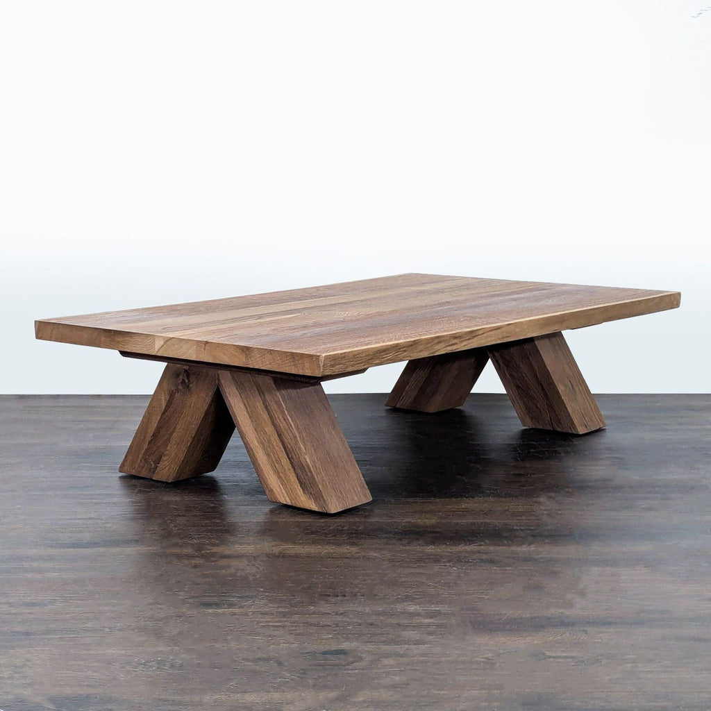 Live edge European oak coffee table from Restoration Hardware, displaying natural knots, cracks, and grain.  