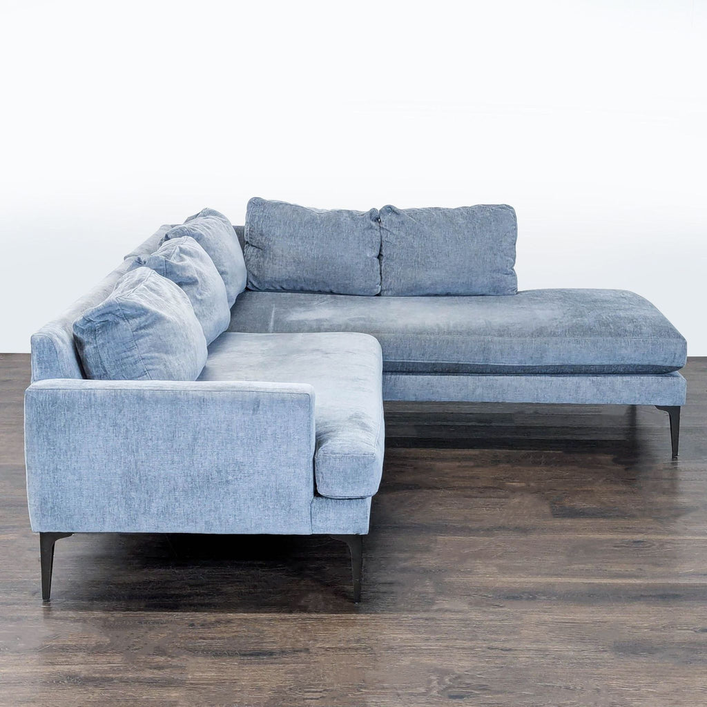 West Elm sectional couch with contemporary style, comfortable seating, and a versatile color for any décor.