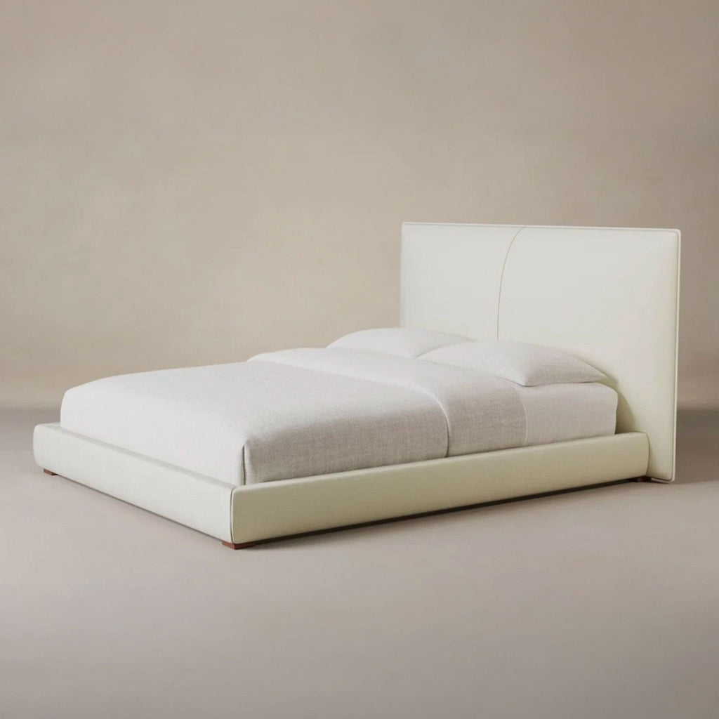 Maiden Home Wythe king bed with tall upholstered headboard and sleek ivory frame, perfect for modern spaces.  