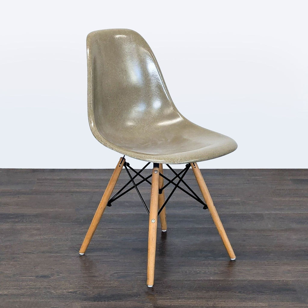 1. Modernica dining chair with sleek, minimalist design and wooden legs, ideal for contemporary dining rooms.
