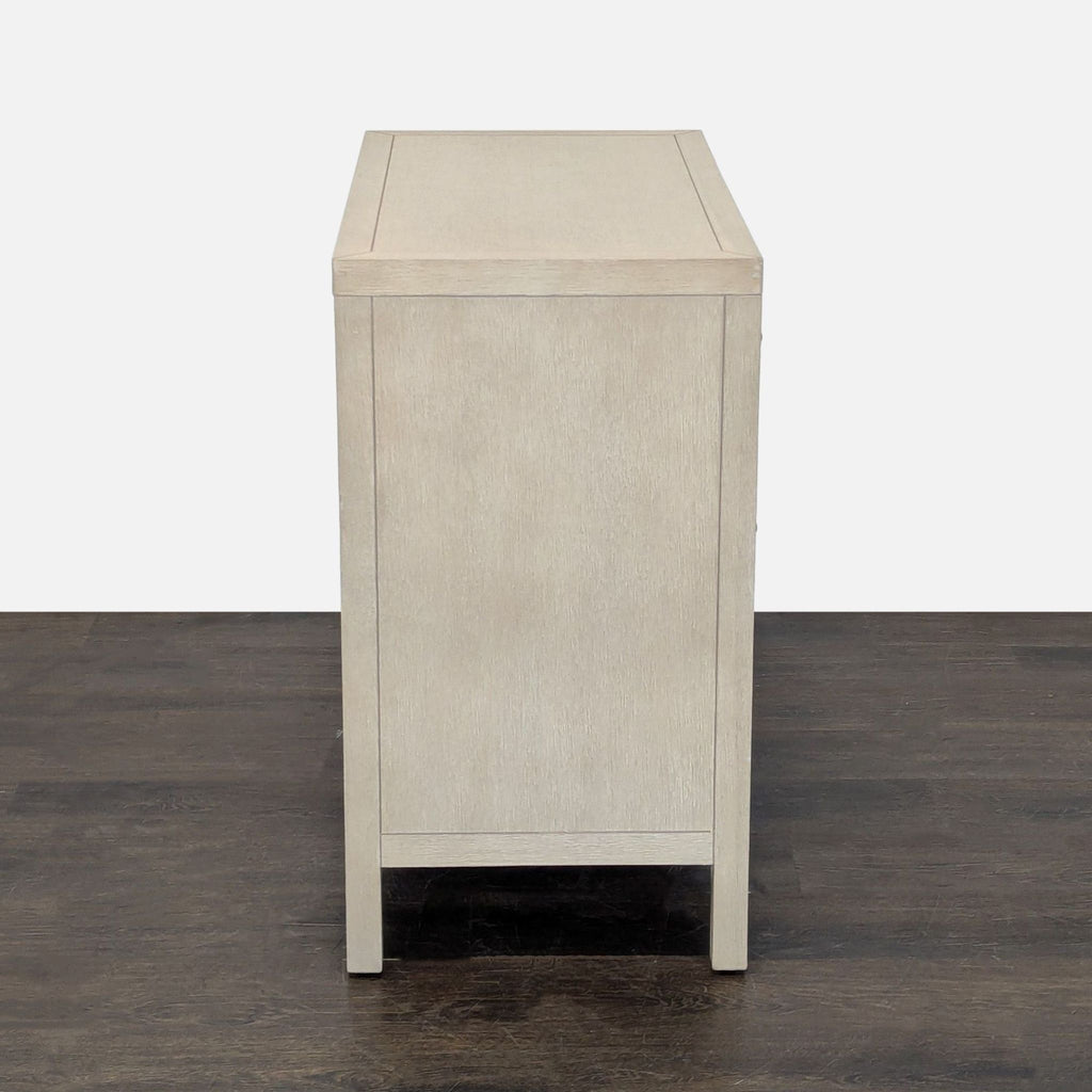 1. Elegant wooden dresser by Butler Specialty Company with multiple drawers, perfect for bedroom storage.