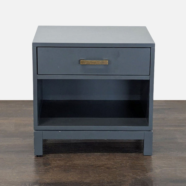 1. The Land of Nod end table with one drawer, open shelf, and metal hardware.